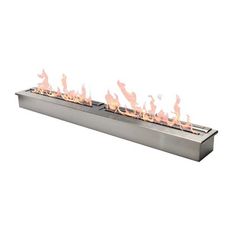 a long metal fire pit with flames on it's sides and the top lit