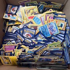 a box filled with lots of pokemon cards