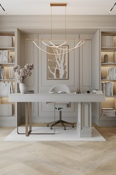 an office with white walls and wooden flooring is pictured in this image, there are bookshelves on either side of the desk