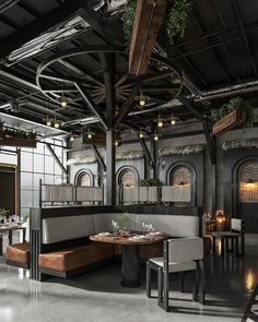 an empty restaurant with lots of tables and chairs in the center, along with plants hanging from the ceiling