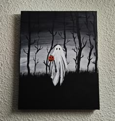 a painting of a ghost with a pumpkin in its mouth on a black and white background