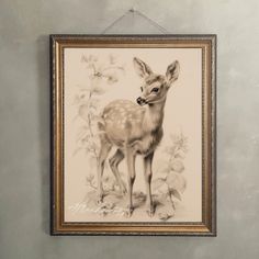 a deer is standing in front of a wall with flowers on it's frame