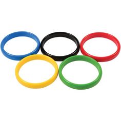 four different colored rubber rings on a white background