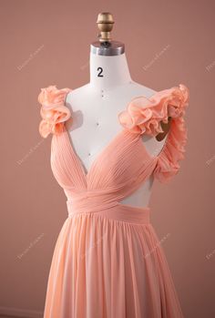 Peach Fairy Ruffled Sleeve Chiffon Plunging Formal Dress. This captivating peach pink chiffon formal dress takes exquisite charm to the next level. Featuring unique ruffled sleeves, sexy cutout detail and lace-up back on the plunging V neckline bodice, this flowing A-line long gown will set a new standard for special occasions. designed by Bettina & Brydealo Factory shown color peach bra support with cups boning no closure back hook + zipper lining fully lined Pink Ruffled Chiffon Dress For Wedding, Pink Chiffon Dress With Ruffles For Formal Occasions, Elegant Apricot Chiffon Dress, Flowy Peach Dress For Wedding, Peach Dress Outfit Wedding, Peach Dress Outfit, Peach Formal Dress, Brown Dresses Outfit, Botas Outfit