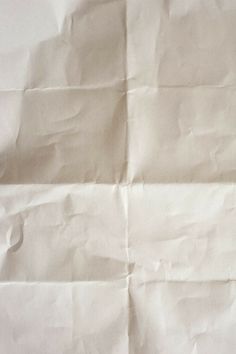 a piece of white paper that has been folded