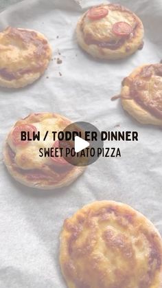 several small pizzas sitting on top of a piece of wax paper with the words blw / tooler dinner sweet potato pizza