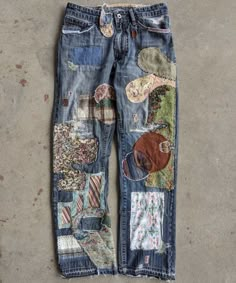 an old pair of jeans with patches on the back and sides, all in different colors