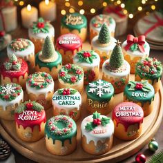 decorated christmas cupcakes on a wooden platter