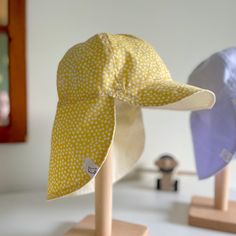 These lightweight, cotton summer hats are designed to keep the sun off of your little ones face and neck during sunny days. Elastic ruching at the back allows for a comfortable, snug fit that will grow with your little one. Sun hats are made to order. The approximate turn around time is 7 business days plus shipping. Currently available in 3 sizes: 6-12 months (approx  Toddler (1-3 years, approx 20in circuference)) Kid (3-10 years Sun Hats ship untracked for $5CDN within Canada. Upgraded shippin Adjustable Cotton Sun Hat With Upf 50+, Cotton Sun Hat With Upf 50+ And Adjustable Fit, Adjustable Cotton Sun Hat, Adjustable Cotton Bucket Hat With Uv Protection, Adjustable Cotton Wide Brim Sun Hat, Cotton Sun Hat With Uv Protection For Playtime, Playtime Cotton Bucket Hat With Wide Brim, Cotton Bucket Hat With Wide Brim For Playtime, Adjustable Upf 50+ Bucket Hat For Playtime