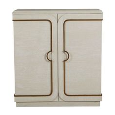 a white cabinet with two doors on one side and an oval design on the other