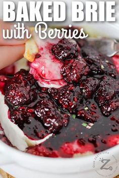 baked brie with berries in a white bowl