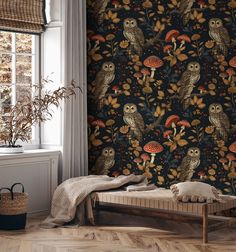 an owl themed wallpaper in a bedroom