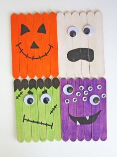 four pops sticks decorated to look like halloween characters