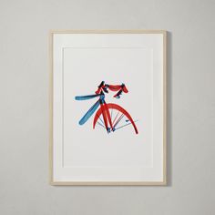 an art print with two red, blue and white dragonflies on it's back