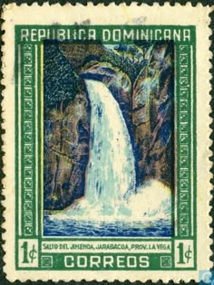 a stamp with a waterfall in the background