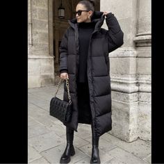 Down Coat With Feather And Down Fill. High Collar With Removable Adjustable Drawstring Hood. Long Sleeves With Interior Cuffs. Long Black Puffer Coat Outfit, Puffer Coat Street Style, Black Puffer Coat Outfit, Black Puffer Outfit, Long Black Puffer Coat