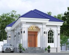 a car is parked in front of a small white house with blue roof and columns