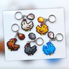 the pixel keychains have been made to look like video games characters