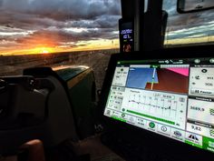 the view from inside a vehicle at sunset