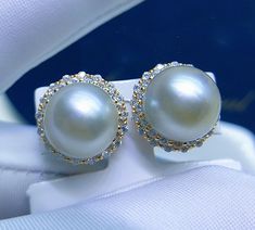 Stunning South Sea Baroque White Pearl Earring Stud, 11.3mm, Bright Warm White with light Gold overtone, Very High Luster.  Sterling Silver S925 with sparkling cubic zircons, Very Well made and Comfortable to wear.   Classic and Elegant   Lustrous Beauty   Super Value  Pearl ★ Genuine White South Sea pearls ★ Size: 11.3mm ★ Shape: Round Baroque ★ Color: Natural untreated, Bright Warm White with light Gold overtone, Beautiful ★ Luster: Very High Luster, Wonderful ★ Surface: Nice, Baroque natural Classic Nickel-free Pearl White Earrings, Nickel-free White Pearl Earrings In 14k Gold, Nickel-free Yellow Gold Round Pearl Earrings, Elegant 14k Gold-filled Pearl White Pearl Earrings, White Pearl Drop Shell-shaped Earrings, White Pearl Earring, Earring Stud, Pearl Earring, South Seas