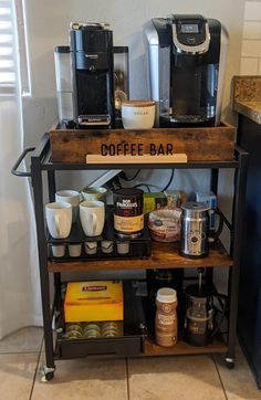 a coffee bar cart with various items on it