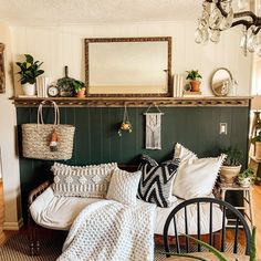 a living room filled with lots of furniture and decor