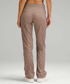 Easy, comfortable, and never clingy, these pants are in our after-practice hall of fame. Designed for Casual. Classic fit is an easy fit that floats away from your body:31.5" inseam, intended to sit below the ankle for heights of 5'5"-5'8". Waistband drawcord helps you customize the fit. Hand pockets with hidden pocket for small items. Hem drawcords let you adjust your look.