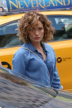 Hair raising: No doubt helping her to stay cool, the star is currently rocking short hair which she wore in messy curls Jennifer Lopez Legs, Messy Curls, Hair Styles 2017, Hair Photo