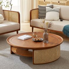 a living room with two chairs and a coffee table in the middle of the room