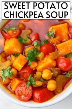 sweet potato chickpea soup in a white bowl with parsley on top and text overlay