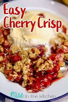 an easy cherry crisp with ice cream and crumbled toppings on a white plate