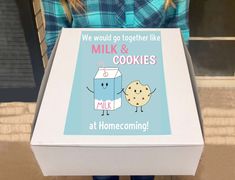 a woman holding up a box that says, we would go together like milk and cookies at prom