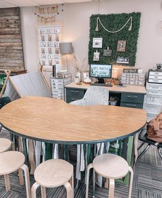 a room filled with lots of different types of furniture and decor on display in it