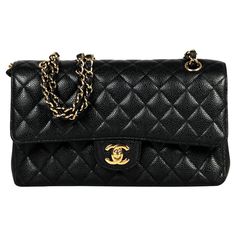 Chanel Black Caviar Leather 10" Medium Double Flap Classic Bag with Goldtone Hardware Made In: France Year of Production: 2021 Color: Black, gold Hardware: Goldtone Materials: Caviar leather, metal Lining: Black leather Closure/Opening: Flap top with CC twistlock and snap flap under Exterior Pockets: Half moon patch pocket Interior Pockets: Zipper pocket on top flap, back section under top flap, two wall pockets in middle section, front section Exterior Condition: Excellent pre-owned condition w Classic Everyday Flap Bag With Gold-tone Logo Plaque, Black Caviar Leather Evening Bag, Everyday Luxury Caviar Leather Bag, Luxury Caviar Leather Bag For Everyday, Luxury Caviar Leather Evening Bag, Classic Leather Flap Bag With Gold-tone Logo, Classic Shoulder Bag With Gold-tone Logo For Everyday Luxury, Classic Gold Bag With Cc Turnlock Closure, Formal Black Shoulder Bag With Gold-tone Logo Plaque