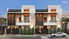 a white car is parked in front of a two story building with balconies