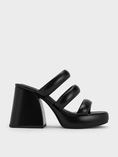 Clean, sculptural lines meet the puffy trend on these Tatti mules. From the impossible-to-miss trapeze platforms to the angular square-toed silhouette complete with three puffy straps, these shoes are certain to make a bold statement, even with an understated black finish. Step out in them on days when you want to elevate your look with minimal effort. Platform Mules, Pu Heels, Charles Keith, Platform Heels, Sales Gifts, Trending Shoes, Occasion Wear, Heel Height, High Heels