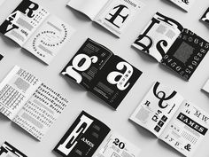 an array of black and white business cards with the letters e, f, g