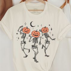 Cream Colored Dancing Pumpkin Skelton Oversized T-Shirt Fall Tee Shirts, Family Homestead, Hot Pink Shirt, Halloween Tee Shirts, Trendy Shirt Designs, Tie Dye Women, Dancing Skeleton, Leopard Print Shirt, Navigating Life