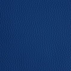 a blue leather texture background with no visible stitchs or lines on it, as well as the color of the material