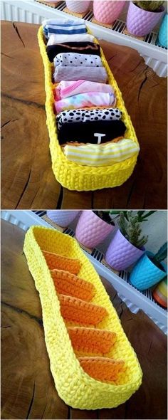 there is a crochet boat that has many different colors on the bottom and sides