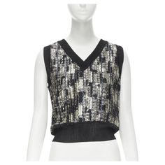 MISSONI blue silver sequins embellished crochet knit cropped vest IT42 M Reference: GIYG/A00201 Brand: Missoni Material: Rayon, Acetate Color: Grey, Blue Pattern: Abstract Made in: Italy CONDITION: Condition: Excellent, this item was pre-owned and is in excellent condition. SIZING Designer size: IT42 Size reference: US4-6 / UK10 / IT42 / FR38 / S-M MEASUREMENTS: Shoulder to shoulder: 33cm / 12.9" Chest: 43cm / 16.8" Waist: 40cm / 15.6" Length: 50cm / 19.5" This Missoni item is authentic. Embellished Crochet, Martine Rose, Oversized Button Down Shirt, Diana Vreeland, Mesh Long Sleeve Top, Flare Top, Butterfly Shirts, Cropped Vest, Puff Sleeve Blouse