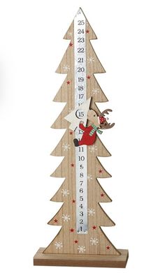 a wooden christmas tree with a ruler on the bottom and numbers on the side,