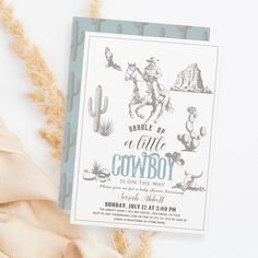 an image of a baby shower party with cactus and cowboy theme on the front cover