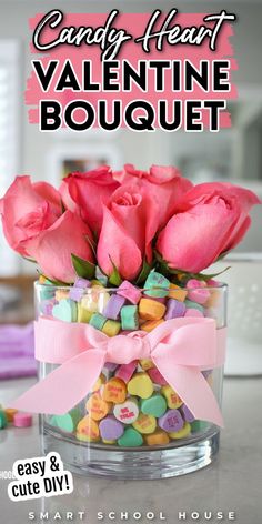 candy heart valentine bouquet in a glass vase with pink roses and conversation bubbles on the side