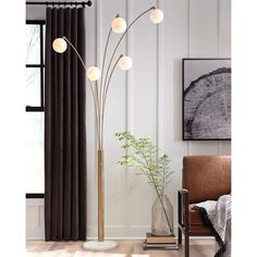 a living room scene with focus on the floor lamp