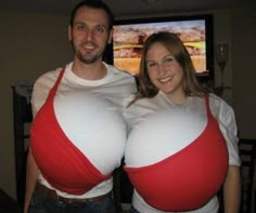 a man and woman dressed up in red and white shirts standing next to each other