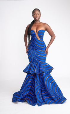 This Yetunde Corset African Print Mermaid Dress is a stunner! She's bold, beautiful and extremely gorgeous. Perfect for your occasions, birthdays, wedding, red carpet events, banquet, prom etc. This dress is 100% handmade, so you are welcome to request a customisation.  You are also welcome to request other fabric patterns. Handmade with 100% African wax cotton Care instructions: Hand wash with mild detergent. Do not bleach Zipper at the back Care Instructions Wash with Mild soap, do not bleach. Please see other beautiful African inspired clothes in our store https://www.etsy.com/uk/shop/Afrothrone Thanks for visiting our store. Gown Ankara, Ankara Maxi Dress, Dress African Print, Royalty Dress, Cotton Corset, Dress Ankara, African Wedding Dress, Dinner Dates, Dress African