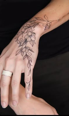 Finger tattoo designs Small finger tattoos Finger tattoo ideas Finger tattoo placement Finger tattoo Flower Vines Hand Tattoo, Vine Tattoos Wrap Around Arm, Vine Tattoos Sleeve Filler, Flower Tattoo On Hand For Women, Hand Tattoos For Women Floral, Palm Hand Tattoos For Women, Fine Line Flower Hand Tattoo, Small Hand Tattoos For Women Simple, Daffodil Hand Tattoo