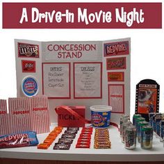 a table that has various items on it and the words, a drive - in movie night