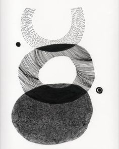 black and white artwork with circles in the middle, on a white paper background that has lines coming out of it